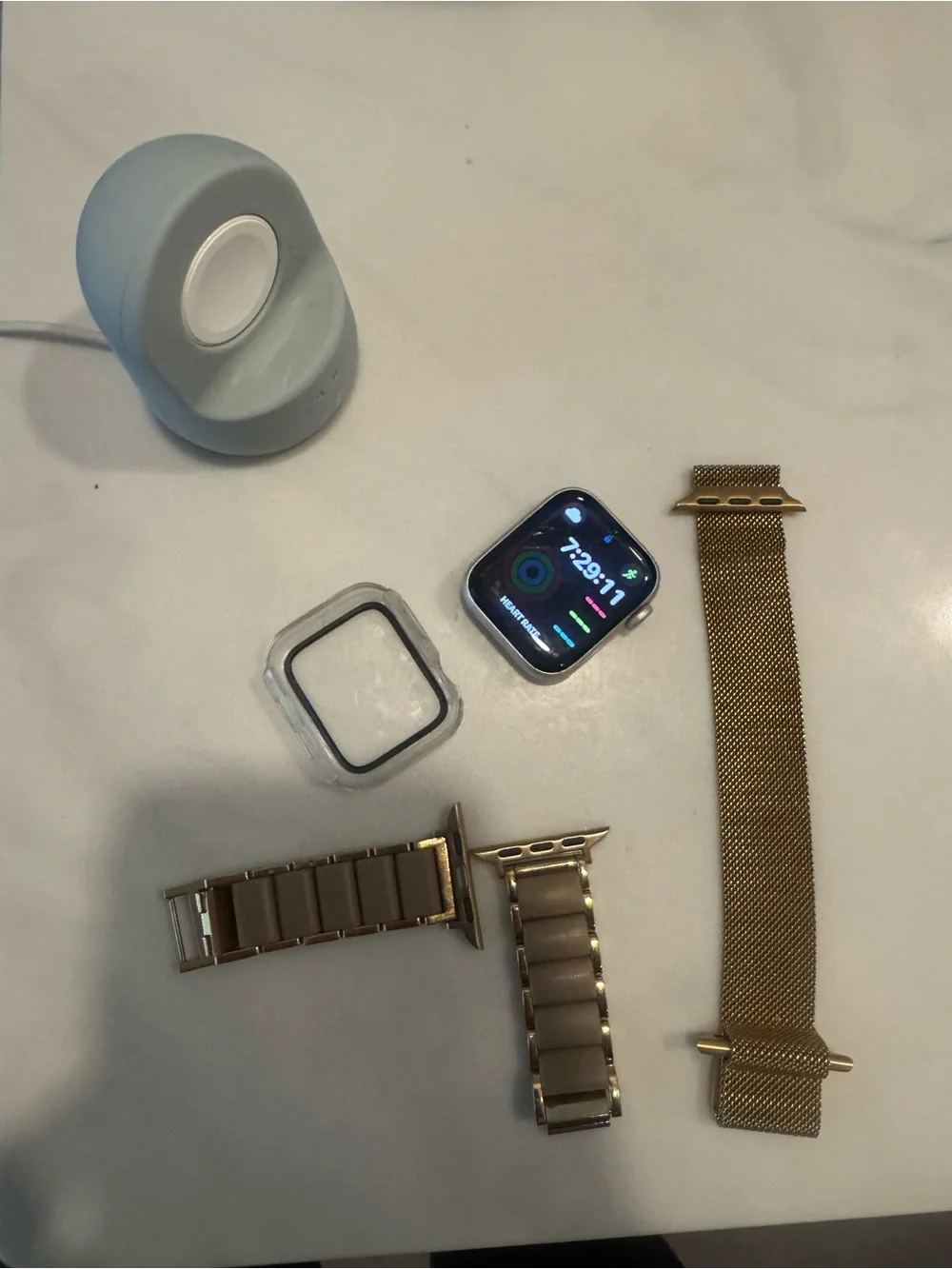 Used Apple Watch SE with Case and Gold Milanese + Link Bands (Gold)